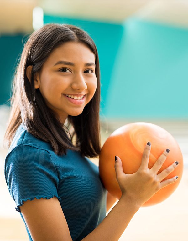 Girl-With-Ball-Having-Fun-At-Bowling-Alley-In-Clubs Girl-With-Ball-Having-Fun-At-Bowling-Alley-In-Clubs